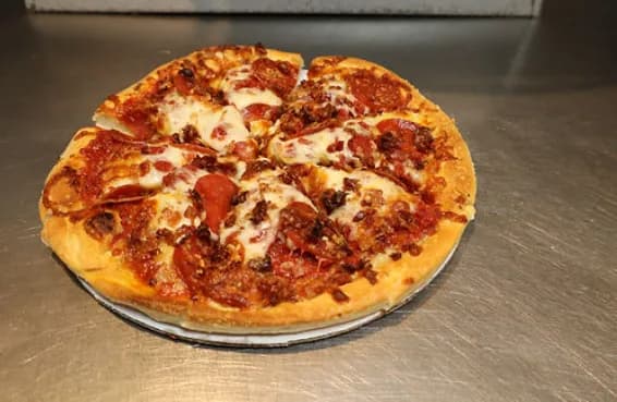 Meat lover pizza with sausage, pepperoni and bacon